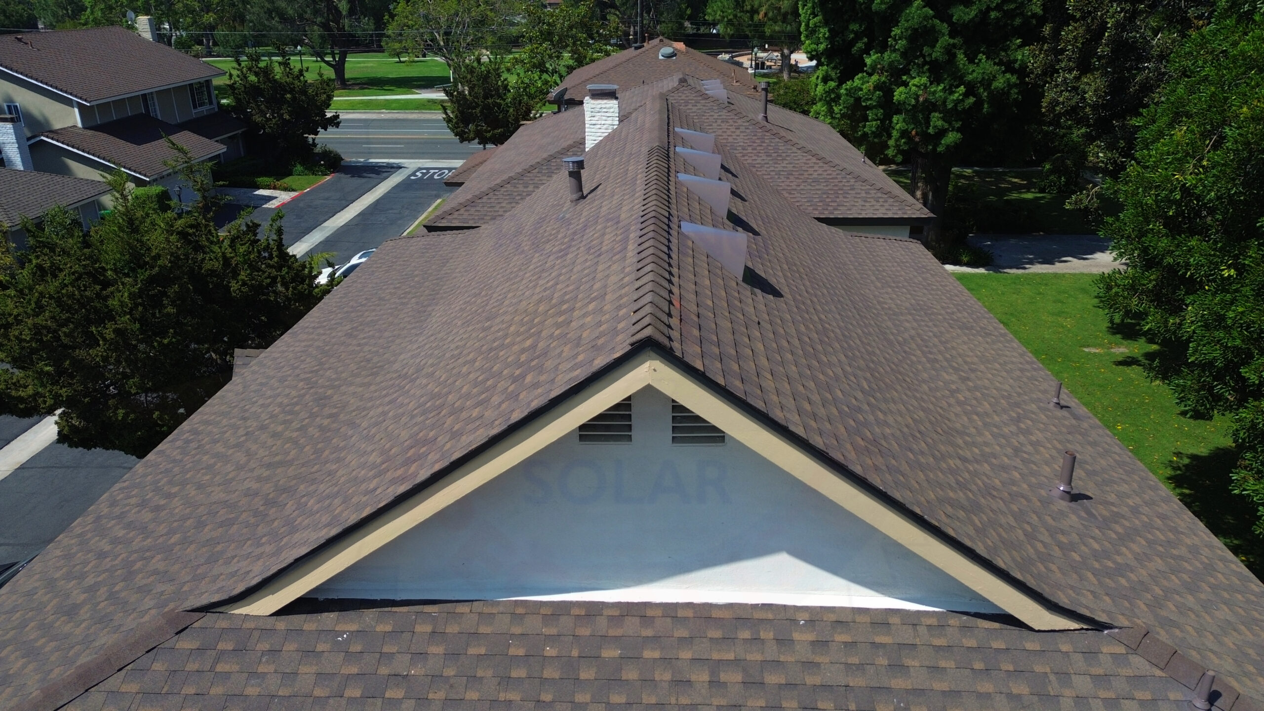 Tustin CA roofing contractor installing GAF Aged Chestnut asphalt shingles