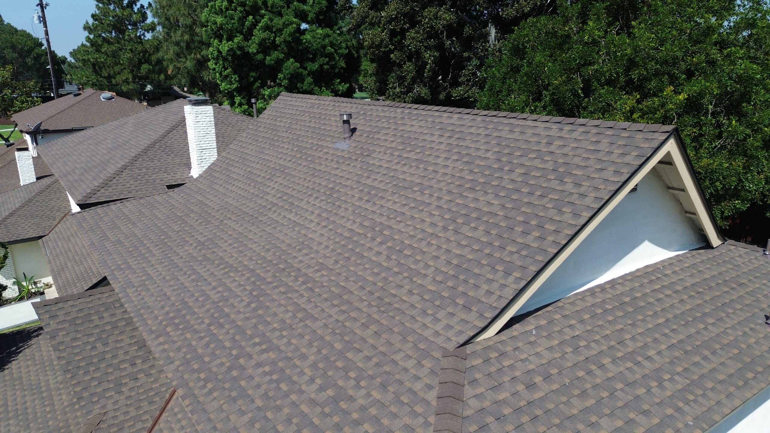 Aerial view of residential roof installation in Orange County by Certified Roofing Specialists